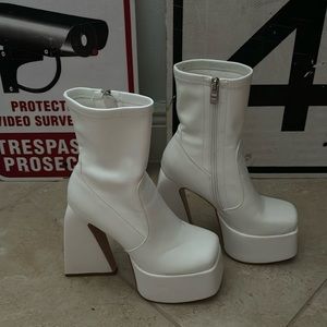 white faux leather platform heeled boots